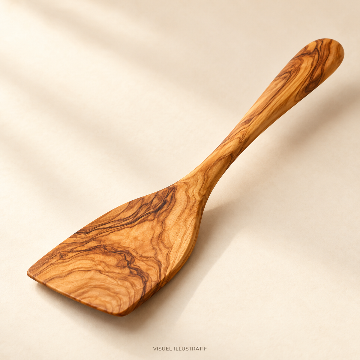 Visuel illustratif généré par IA — Spatule en bois d’olivier ; modèle à confirmer