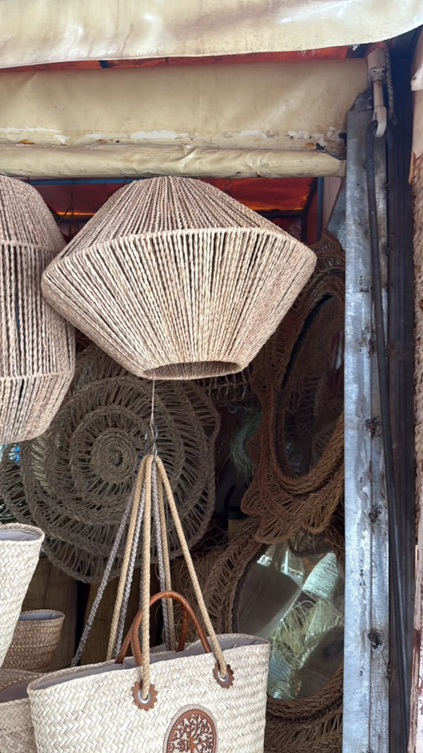 Wide diamond-shaped woven lampshade, central item in the supplied shop photograph.