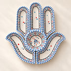 Blue and White Hamsa Appetiser Serving Dish — studio view. AI-generated product visualisation.